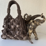 Фото из отзыва к Шнур вязаный 5 мм шоколадный (люрекс золото) с сердечником